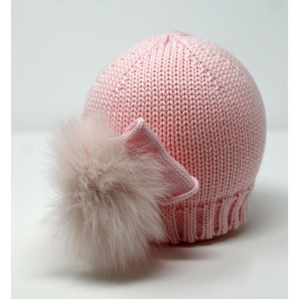 Hat in merino whool realized with whool bow and real fox pon pon attached on the side colour baby pink