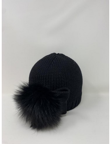 Hat in merino wool realized with whool bow and real fox pon pon attached on the side colour black
