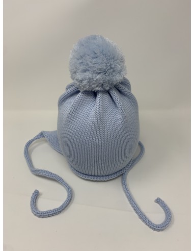 Lappone neonato rasato in 100% lana merino tinta unita con pon pon in lana colore azzurro chiaro