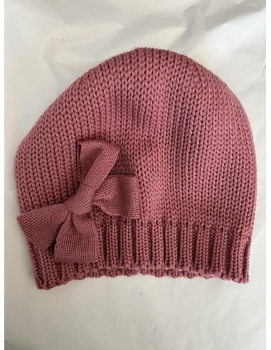 Modello 100% lana con fiocchetto colore rosa scuro