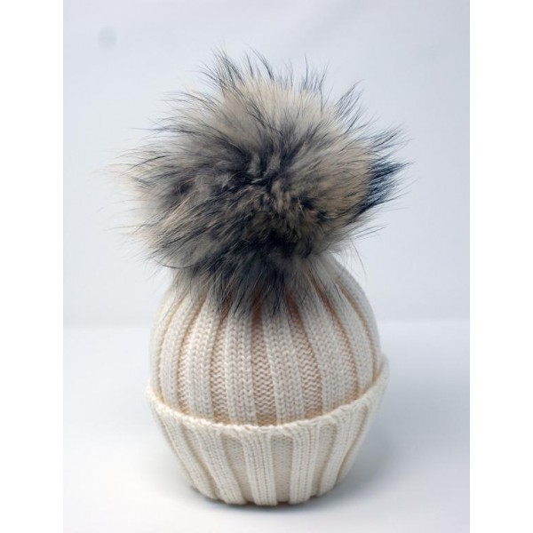 Hat realized in 100% merino whool made in italy ribbed with real fur pon pon color white